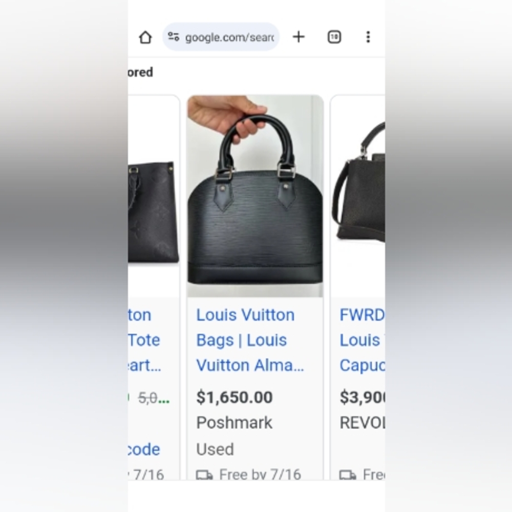 Louis Vuitton purse ,black zebra print, mid sized